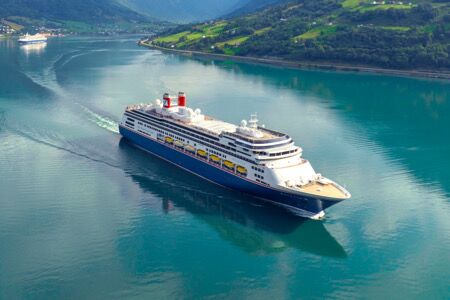 Fred Olsen ship sailing through Norway’s fjords